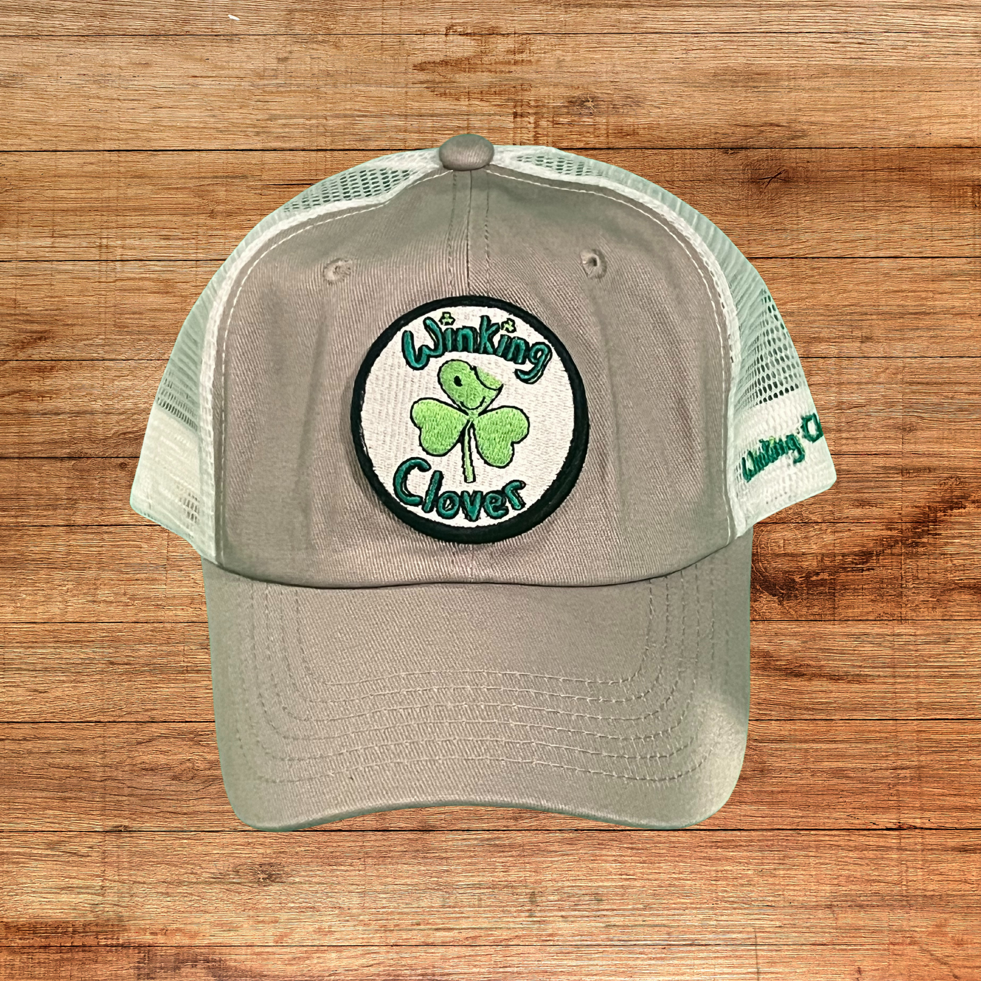 Unstructured Trucker Base Hat – Winking Clover